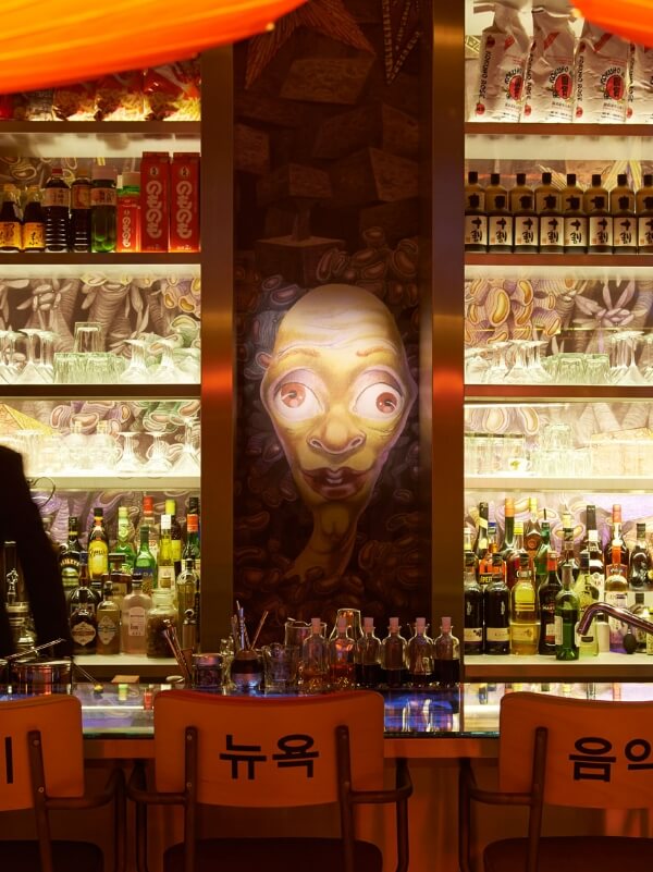 Miss Kō - Photograph of the bar with illustrated tapestry